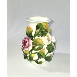 Small porcelain vase with roses and leaves all around brush holder